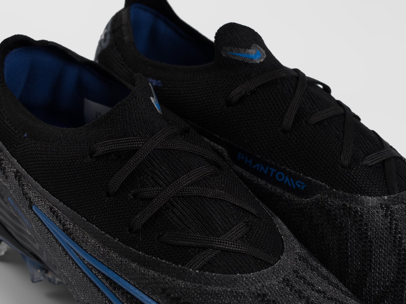 Футбольная обувь Nike Gripknit Phantom GX Elite FG